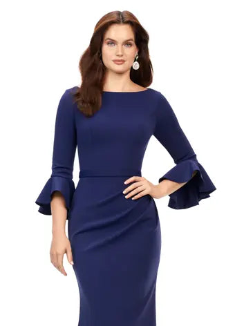 Ashley Lauren 11325 Crew Neck Three Quarter Flutter Sleeves Ruched Skirt Fitted Gown. This timeless and elegent evening gown features flutter three quarter sleeves. The skirt is adorned with ruching and finished with a sweep train.
