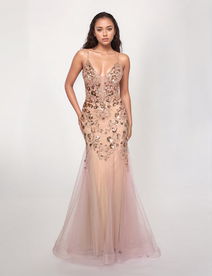 Elevate your formal occasion with the Nina Canacci 1576 gown, a long, fitted mermaid dress adorned with shimmering sequins. Its plunging neckline adds a sophisticated allure, while the tailored silhouette enhances your natural curves for a striking, elegant presence. Perfect for prom or any upscale event, this gown combines glamour and expert craftsmanship to ensure you stand out with confidence and style.

Sizes: 0-14

Colors: Black, Dark Green, Rose Gold