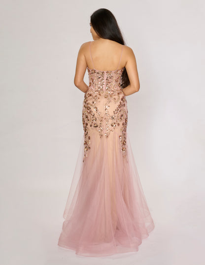 Elevate your formal occasion with the Nina Canacci 1576 gown, a long, fitted mermaid dress adorned with shimmering sequins. Its plunging neckline adds a sophisticated allure, while the tailored silhouette enhances your natural curves for a striking, elegant presence. Perfect for prom or any upscale event, this gown combines glamour and expert craftsmanship to ensure you stand out with confidence and style.

Sizes: 0-14

Colors: Black, Dark Green, Rose Gold