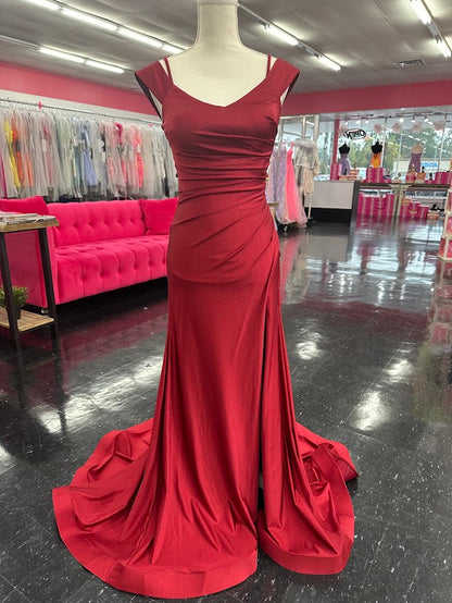 The Nina Canacci 1578 gown is a masterful blend of elegance and modern design. Crafted from fitted emerald jersey fabric, it contours the body with precision. The off-the-shoulder neckline highlights the collarbone, while the ruched detailing adds texture and sophistication. A slit enhances mobility and allure, complemented by a graceful train that elevates the gown’s formal appeal. Ideal for upscale events, this dress combines comfort with striking style for a confident, polished look.

Size: 4

Color: Bur