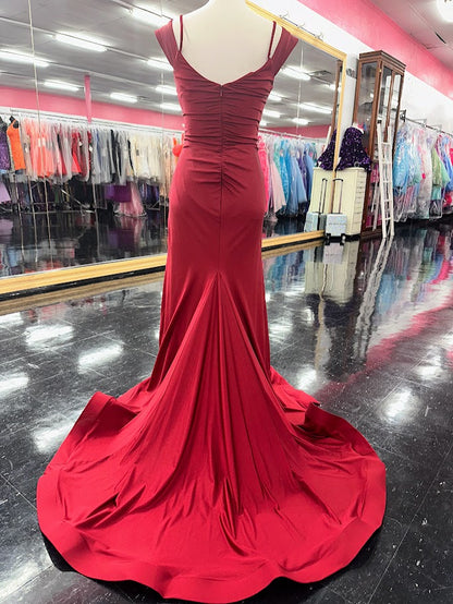 The Nina Canacci 1578 gown is a masterful blend of elegance and modern design. Crafted from fitted emerald jersey fabric, it contours the body with precision. The off-the-shoulder neckline highlights the collarbone, while the ruched detailing adds texture and sophistication. A slit enhances mobility and allure, complemented by a graceful train that elevates the gown’s formal appeal. Ideal for upscale events, this dress combines comfort with striking style for a confident, polished look.

Size: 4

Color: Bur