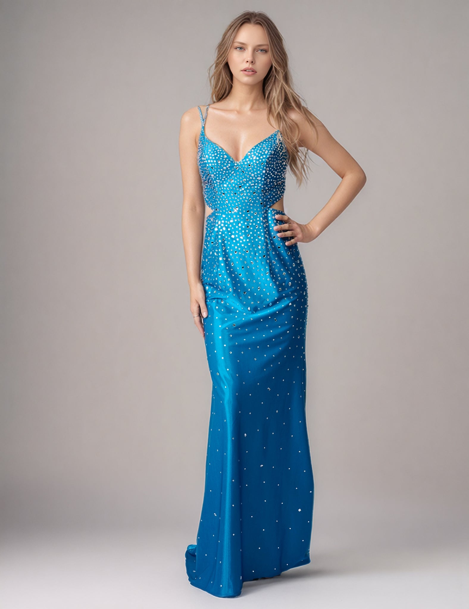 This Nina Canacci design showcases masterful construction with its signature cut glass mirror embellishments that deliver exceptional light refraction and visual depth. The mermaid silhouette provides a refined fit through the bodice and hips, transitioning into a graceful sweep. The backless cut demonstrates confident design, offering both architectural interest and modern elegance. Crafted for discerning customers who appreciate quality craftsmanship and timeless formal wear that commands attention.

Size