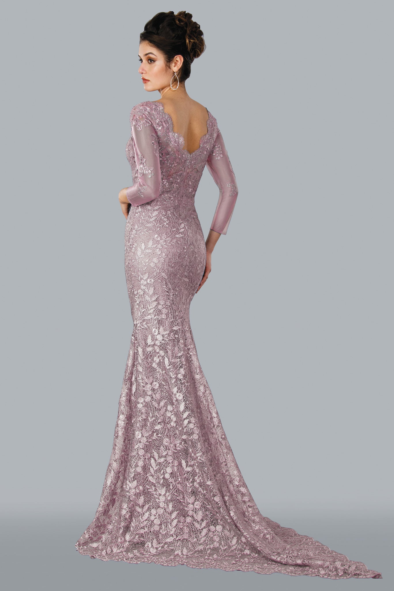 Experience elegance in the Stella Couture 22355 Fitted Lace Gown. This timeless design features a sheer long sleeve, a scallop lace v neckline, and couture lace detailing. Perfect for a special occasion.  Stella Couture 22355 Long Fitted Lace Gown  Available Color- Rose, Slate  Available Size-4-20