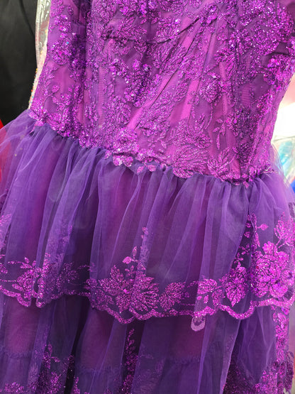 Expertly designed to flatter plus size figures, the Abby Rose 3311 Homecoming Dress exudes elegance and glamour. The one shoulder neckline is adorned with sparkling sequins that catch the light with every move, while the corset detailing accentuates your curves. Perfect for any special occasion.

Sizes: 28