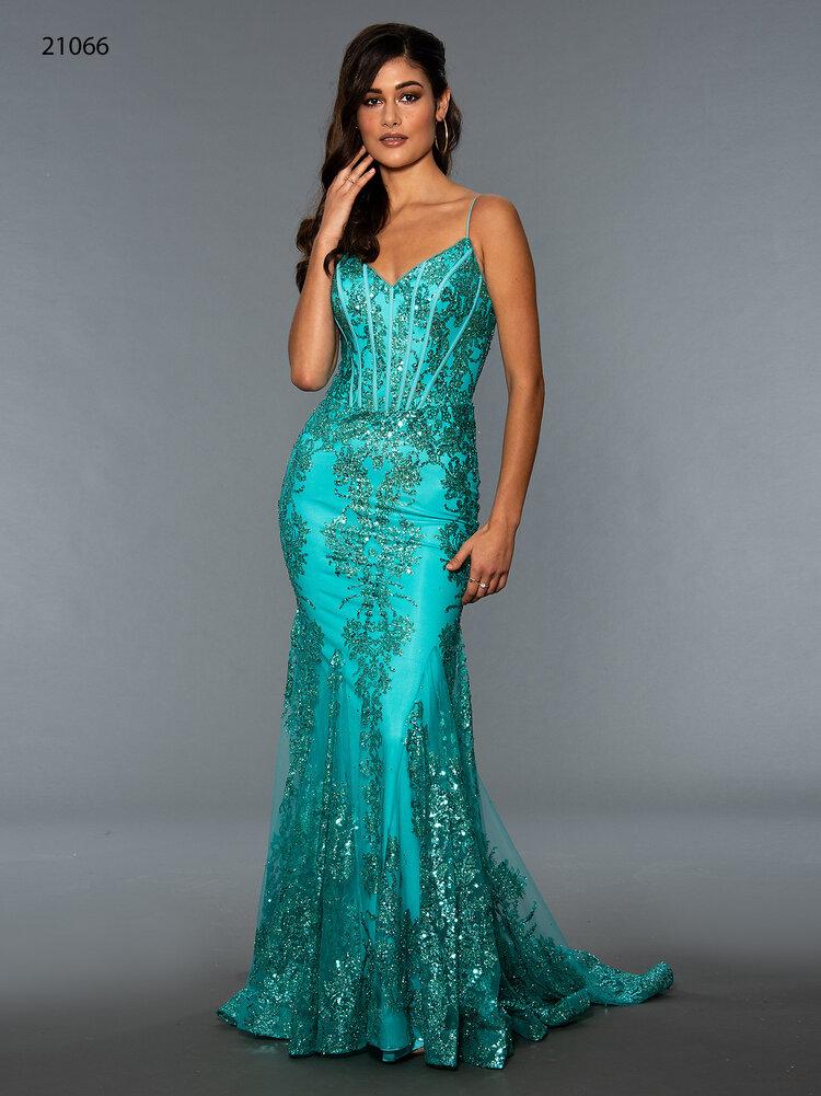 Stella Couture 21066 is a stunning V neckline glitter embellished fitted mermaid prom & Pageant Dress. Featuring a corset design bodice with boning and a v neckline. Lush mermaid silhouette with a sweeping train. sheer back. Great for Prom & Pageant  Available Size: 0-18  Available Color: Red, Silver, Gold, Black, Turquoise, Green, Yellow, Rose, Royal, Navy, Emerald