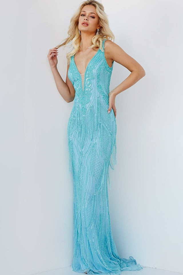 Jovani 22712 V-Neck Floor Length Skirt With Beaded Fringe Prom Dress.  Experience the dramatic beauty of Jovani 22712, a stunning beaded prom dress with a plunging V-neck, sheer mesh insert, and floor-length skirt with beaded fringe and train. This fitted dress features an open low V-back with a hidden zipper and hook-and-eye closure,