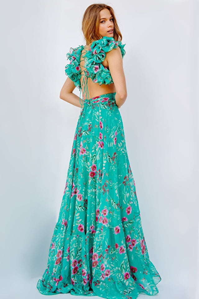 Jovani 23321 Floral Print Chiffon Maxi Pleated Bodice Criss-Cross From V-Neck Prom Dress. Be the belle of the ball in the Jovani 23321 velvet maxi dress. Boasting a criss-cross pleated bodice and a unique floral print, this elegant look is perfect for special occasions. A V-neckline and an airy chiffon skirt complete the glamorous look