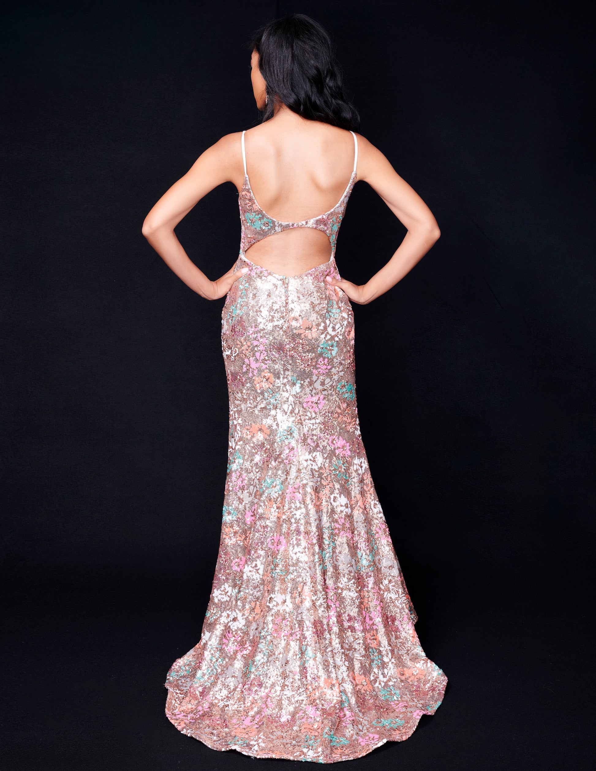 <p data-mce-fragment="1">Be the star of the evening in the Nina Canacci 2393 Sequin Floral Prom Dress. This stunning gown features a beautiful floral sequin design, a flattering backless style, and a fitted V neck silhouette. Perfect for formal events or as a guest, this dress will have all eyes on you.</p> <p data-mce-fragment="1">Sizes: 0-12</p> <p data-mce-fragment="1">Colors: Gold/Multi</p>