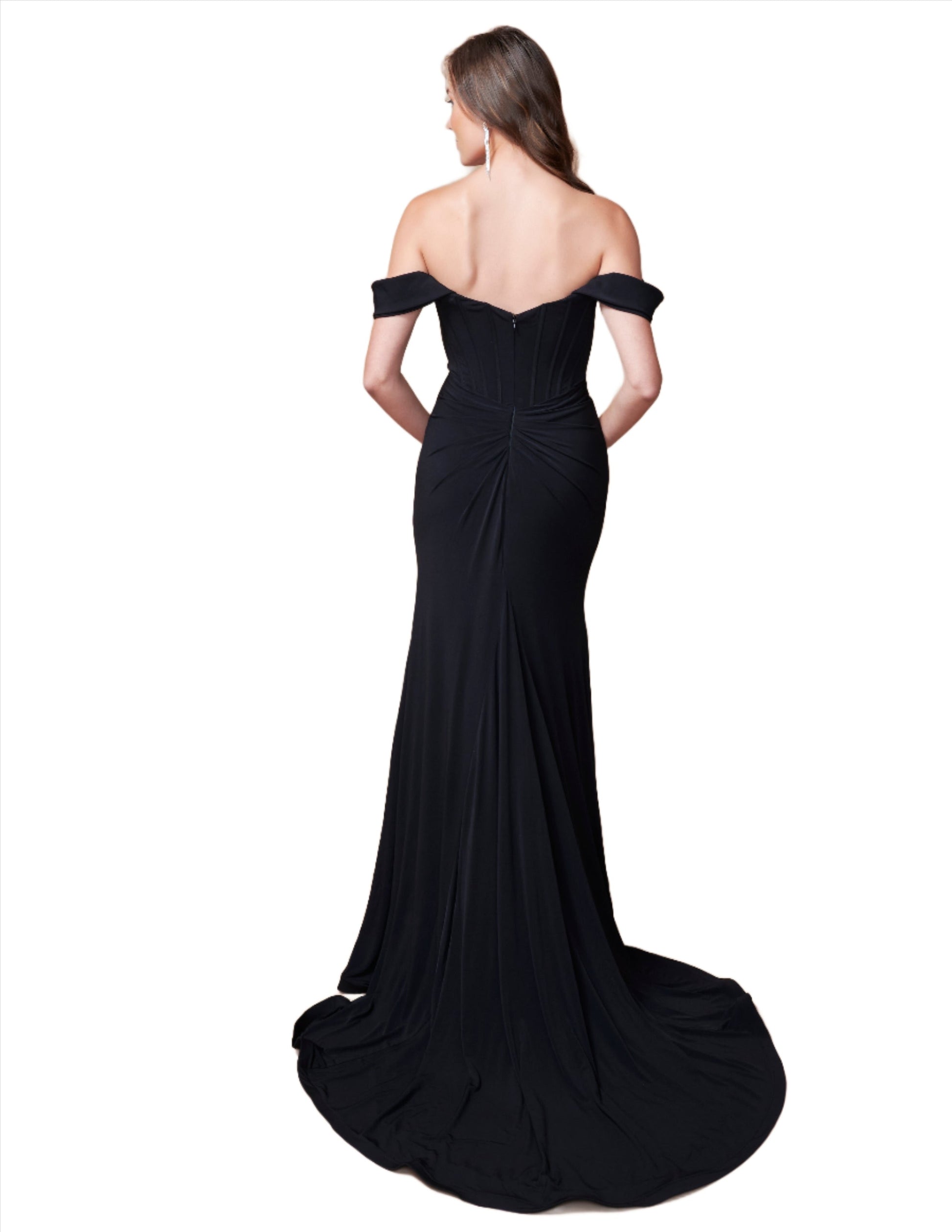 The Nina Canacci 2398 Fitted Corset Dress is a stunning evening gown that features an off the shoulder design and a flattering scoop neck. The fitted corset cinches the waist for a beautiful silhouette, while the slit adds a touch of elegance. Perfect for any formal occasion, this dress is sure to make you stand out.