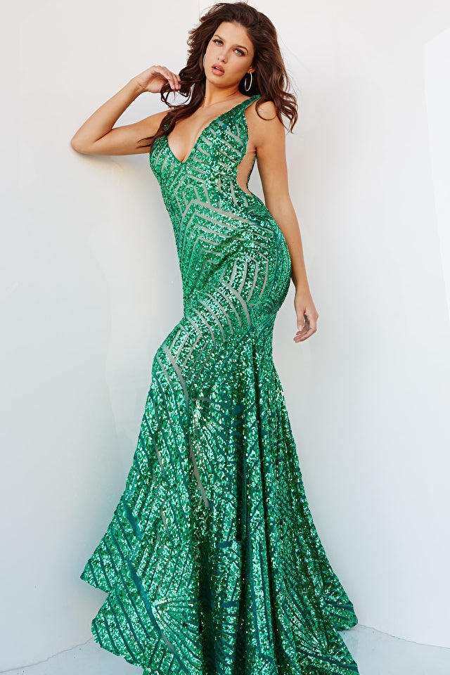 Jovani 24097 V-Neck Sheath Sequin Embellished Fabric Over Nude Lining Prom Dress. The Jovani 24097 Emerald V Neck Sheath Sequin Prom Dress is perfect for your next special event. This dress is sure to turn heads with its captivating emerald color and shimmering sequin embellishments. The form-fitting silhouette and floor-length design create a stunning and flattering appearance, while the plunging V-neck, illusion side cutouts, and open back add an alluring touch.