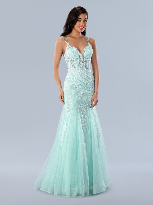 The Stella Couture 24229 is a stunning choice for prom. Crafted from shimmer fabric, this sleek and stylish mermaid dress features sequin lace detail and a sheer corset to ensure a show-stopping look. With a backless design, it's sure to turn heads.  Sizes: 0-16  Colors: Aqua