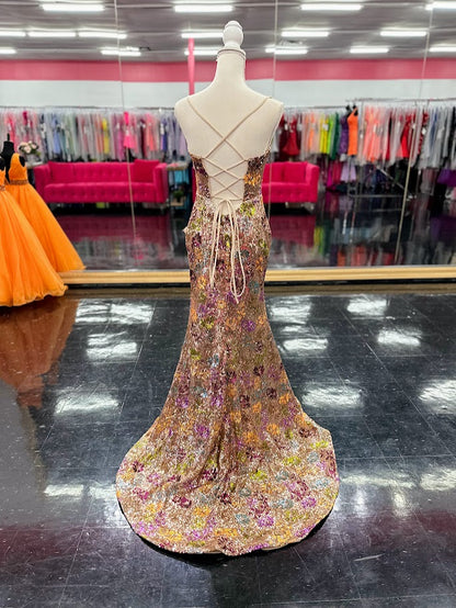 Elevate your evening with the Nina Canacci 2428, a size 4 fitted prom dress that exudes elegance. This gold gown features intricate floral sequins, a flattering scoop neckline, and a daring backless corset design. The thigh-high slit adds a touch of allure, making it perfect for unforgettable formal occasions.

Size: 4

Color: Gold