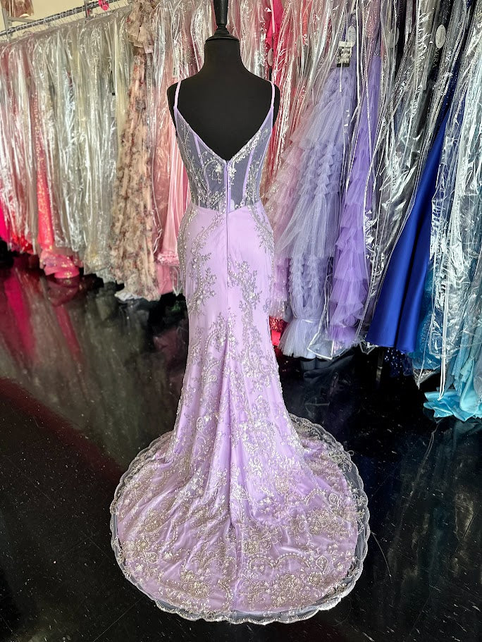 Elevate your evening with the Nina Canacci 2437, a size 4 black mermaid gown featuring intricate beading and a sheer corset design. This sophisticated prom dress contours your silhouette gracefully, combining elegance with a modern edge for unforgettable formal occasions.

Size: 4

Color: Lavender