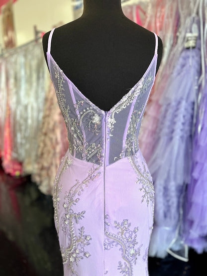 Elevate your evening with the Nina Canacci 2437, a size 4 black mermaid gown featuring intricate beading and a sheer corset design. This sophisticated prom dress contours your silhouette gracefully, combining elegance with a modern edge for unforgettable formal occasions.

Size: 4

Color: Lavender