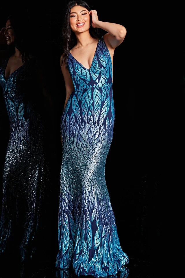 The Jovani 25687 is a captivating prom dress with a seamless Invisible Back Zipper and Hook and Eye Closure. The dress features iridescent sequins, creating a mesmerizing effect on the form-fitting silhouette. The floor-length skirt gracefully sweeps the floor and includes a sweeping train for added drama and sophistication. The sleeveless bodice is adorned with sheer sides, introducing a modern and alluring element to the dress. 