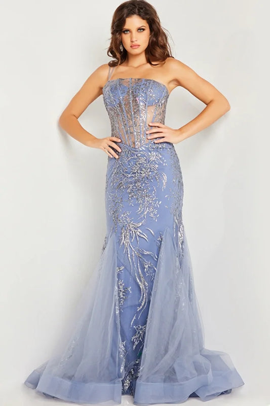 The Jovani 26112 is a glamorous prom dress from the formal collection, designed to make a stunning and unforgettable statement at your special event. Crafted from mesh, this dress is lightweight and breathable, providing a modern and luxurious appearance. It is adorned with glitter embellishments that add a touch of opulence and shimmer to your overall look.