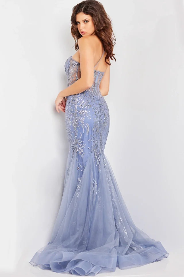 The Jovani 26112 is a glamorous prom dress from the formal collection, designed to make a stunning and unforgettable statement at your special event. Crafted from mesh, this dress is lightweight and breathable, providing a modern and luxurious appearance. It is adorned with glitter embellishments that add a touch of opulence and shimmer to your overall look.