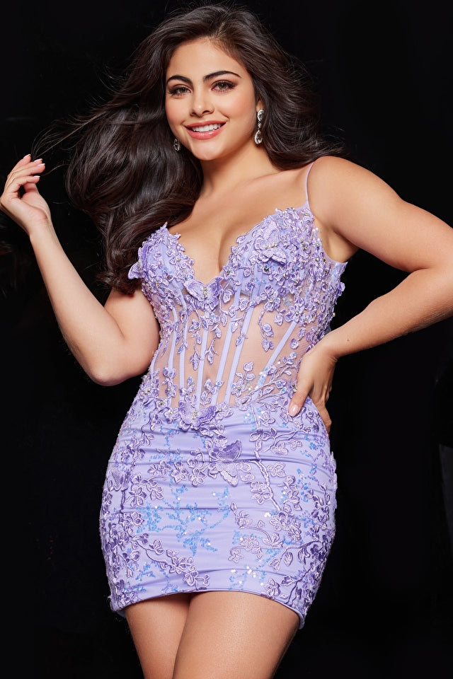 Jovani 26194 Embroidered Illusion Bodice Sequin Embroidery Homecoming Dress. Look Stunning in the Jovani 26194 Lilac Embroidered Illusion Bodice. This stunning cocktail dress is perfect for any special occasion, from homecoming to a night out. The dress features intricate sequin embroidery and an illusion bodice that adds a touch of elegance and sophistication to the overall design. With a fitted style and a V-neckline, this dress will flatter any body type and leave you feeling confident and beautiful.
