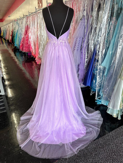 Elevate your evening with the Johnathan Kayne 2657 prom dress, featuring a delicate lilac tulle A-line silhouette that gracefully flatters size 4 figures. The intricate lace front adds timeless elegance, while the dual slits offer a modern, alluring touch. A flattering V-neckline completes this sophisticated formal gown, perfect for making a memorable statement at any special occasion. *ONE OF A KIND*

Size: 4

Color: Lilac