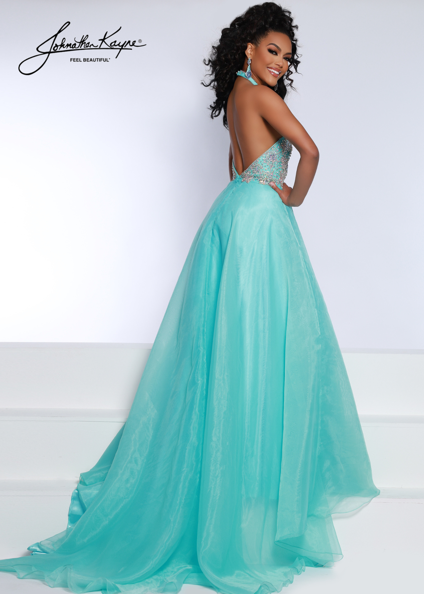 Johnathan Kayne 2676 A Line Halter Maxi Slit Prom Dress Backless Pageant Gown Crystal Grace the stage in this divine A-line! This organza gown features a hand beaded halter bodice with a deep plunge for a touch of modern sophistication.  Sizes: 00-16  Colors: Aqua, Neon Pink