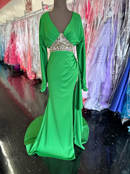Elevate your evening with the Johnathan Kayne 2685 long sleeve formal gown in a stunning teal hue. This size 4 dress features a high slit that adds a touch of allure, while delicate crystal and sheer beading embellishments create an exquisite, sophisticated shimmer. Perfect for making a graceful statement at any formal event.

Size: 4

Color: Green
