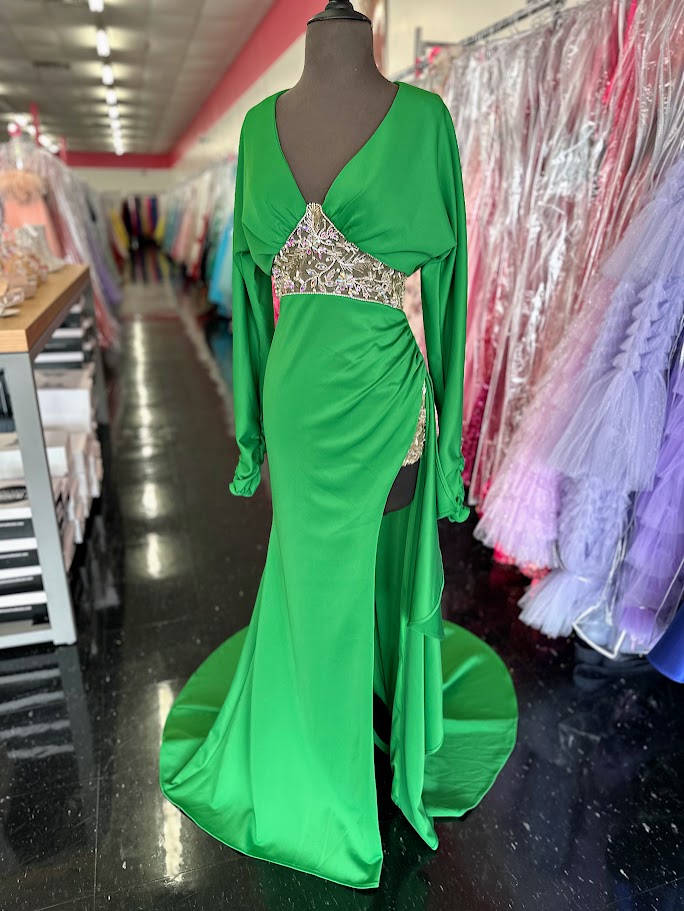 Elevate your evening with the Johnathan Kayne 2685 long sleeve formal gown in a stunning teal hue. This size 4 dress features a high slit that adds a touch of allure, while delicate crystal and sheer beading embellishments create an exquisite, sophisticated shimmer. Perfect for making a graceful statement at any formal event.

Size: 4

Color: Green