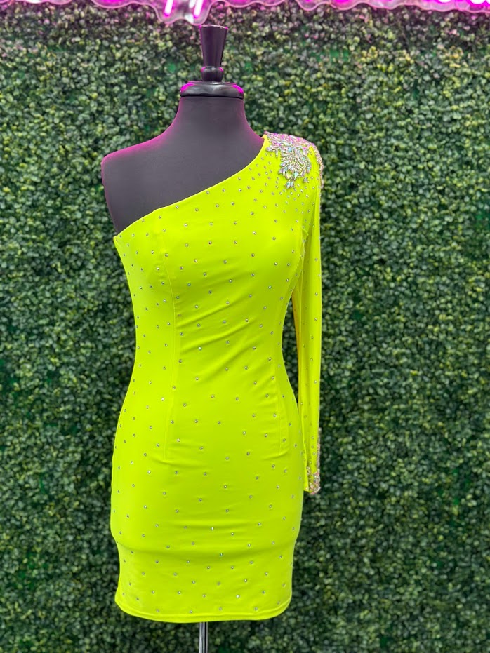 This Johnathan Kayne 2785 dress is perfect for your homecoming event. It features a single crystal shoulder, long sleeve with crystal wrist line, and stoned bodice for a sparkling look. It is also fitted for a flattering silhouette. Perfect for a memorable night.  Sizes: 4  Colors: Neon Green
