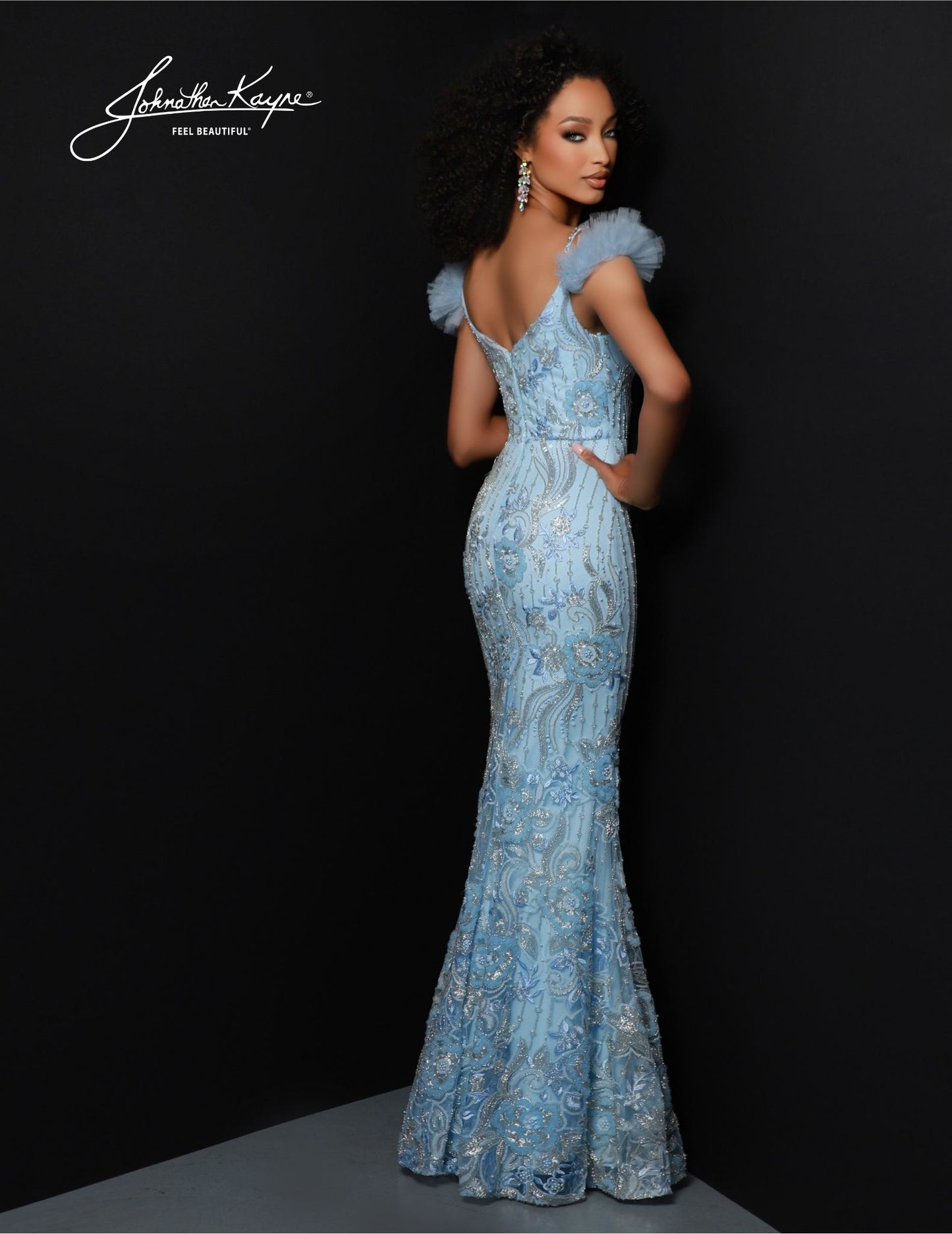 Johnathan Kayne 2828 is the perfect choice for your formal occasion. This fitted mermaid gown features an off-shoulder neckline, V-neck, beaded mesh and an overskirt. The timeless design will make sure you look elegant and sophisticated. Discover icy perfection! This Beaded Mesh gown shimmers like ice crystals, while the detachable overskirt completes your transformation into the true queen of prom.