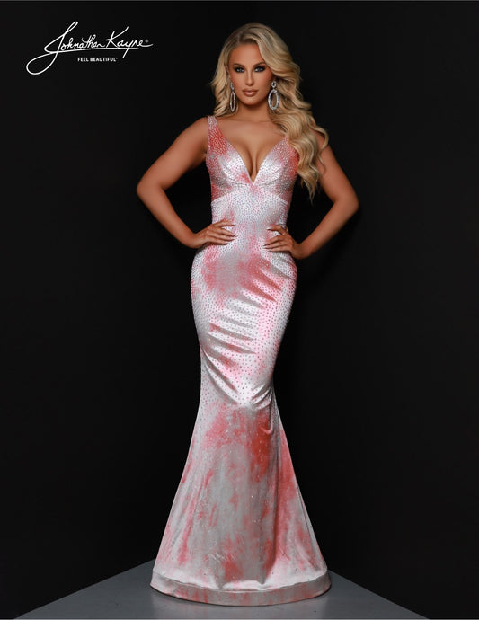 Johnathan Kayne 2831 is a long, formal mermaid gown perfect for all your special occasions. This elegant V Neck design is adorned with gorgeous sequins for a sparkling look and is sure to make you feel like the belle of the ball. Show off your curves with this stunningly beautiful dress for an unforgettable night! Get ready to steal the show in our best-selling silhouette, now adorned in a printed shiny Lycra gown. This piece promises to illuminate every room you enter.