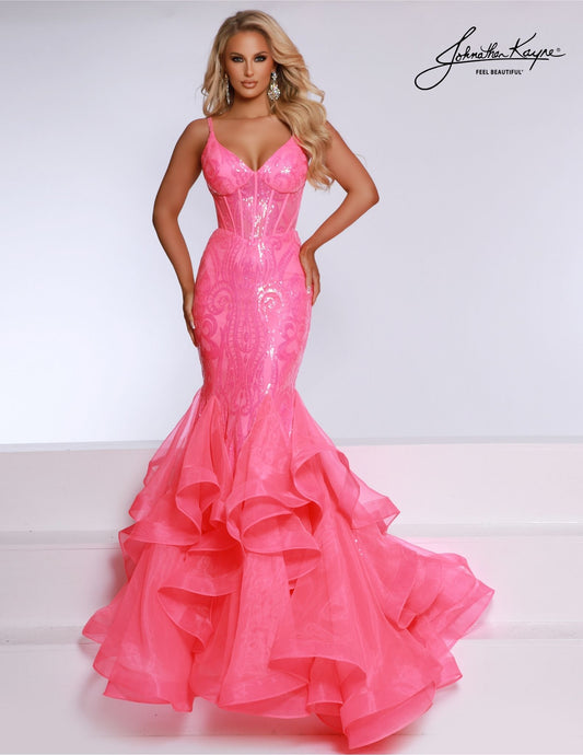 This Johnathan Kayne 2835 Long Prom Dress features a ruffled mermaid corset, V-neck, and a formal pageant gown design. The mermaid silhouette and exposed boning bodice create a unique, flattering hourglass shape that accentuates your curves while adding a dramatic touch to your look.