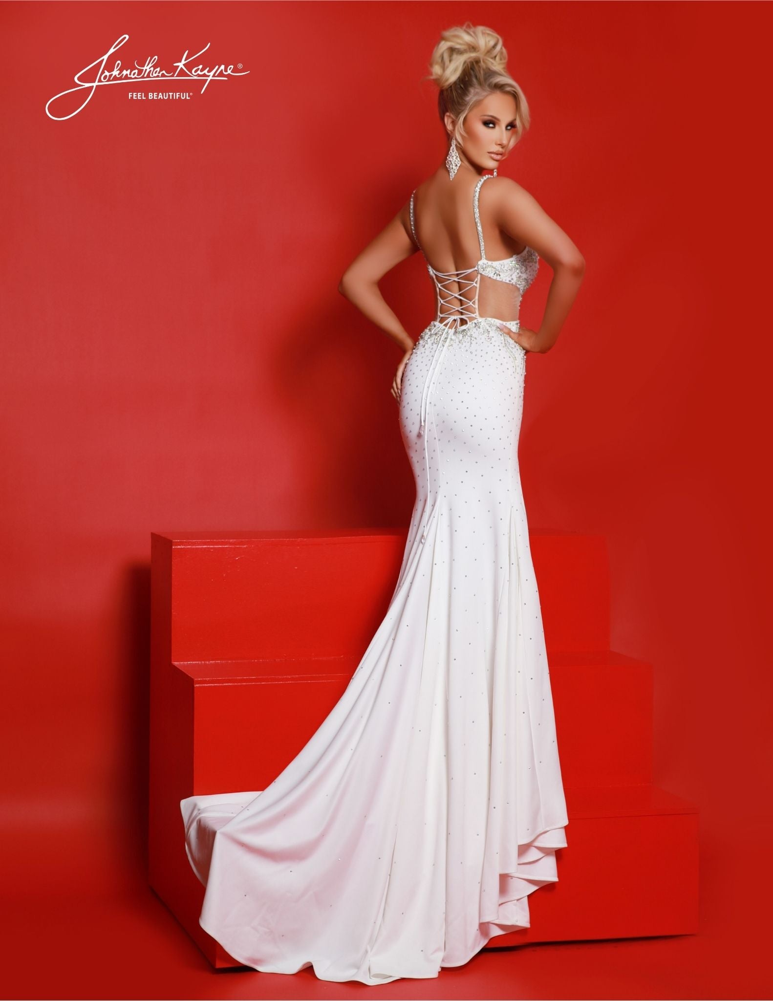 Johnathan Kayne 2846 is the perfect long prom dress for special occasions. Featuring a fitted plunging neckline and a classic high slit, this sophisticated formal pageant gown is complete with side cut outs. Look your best in this stunning evening look. Steal the spotlight in this heavy knit gown. Flirty side cutouts, thigh-high slit, and a corset closure transform this dress into a show-stopping statement of style.