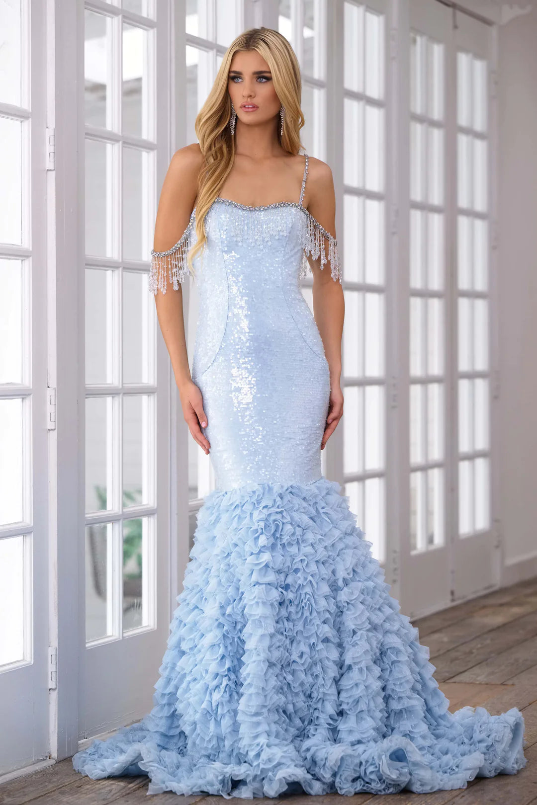 This Mermaid Long Prom Sequin Dress is designed with intricate beaded detailing and layered ruffles, creating a stunning and elegant look. Its fitted silhouette and spaghetti straps make for a flattering and comfortable fit. Perfect for formal events and pageants, this dress will make you feel like a true mermaid.