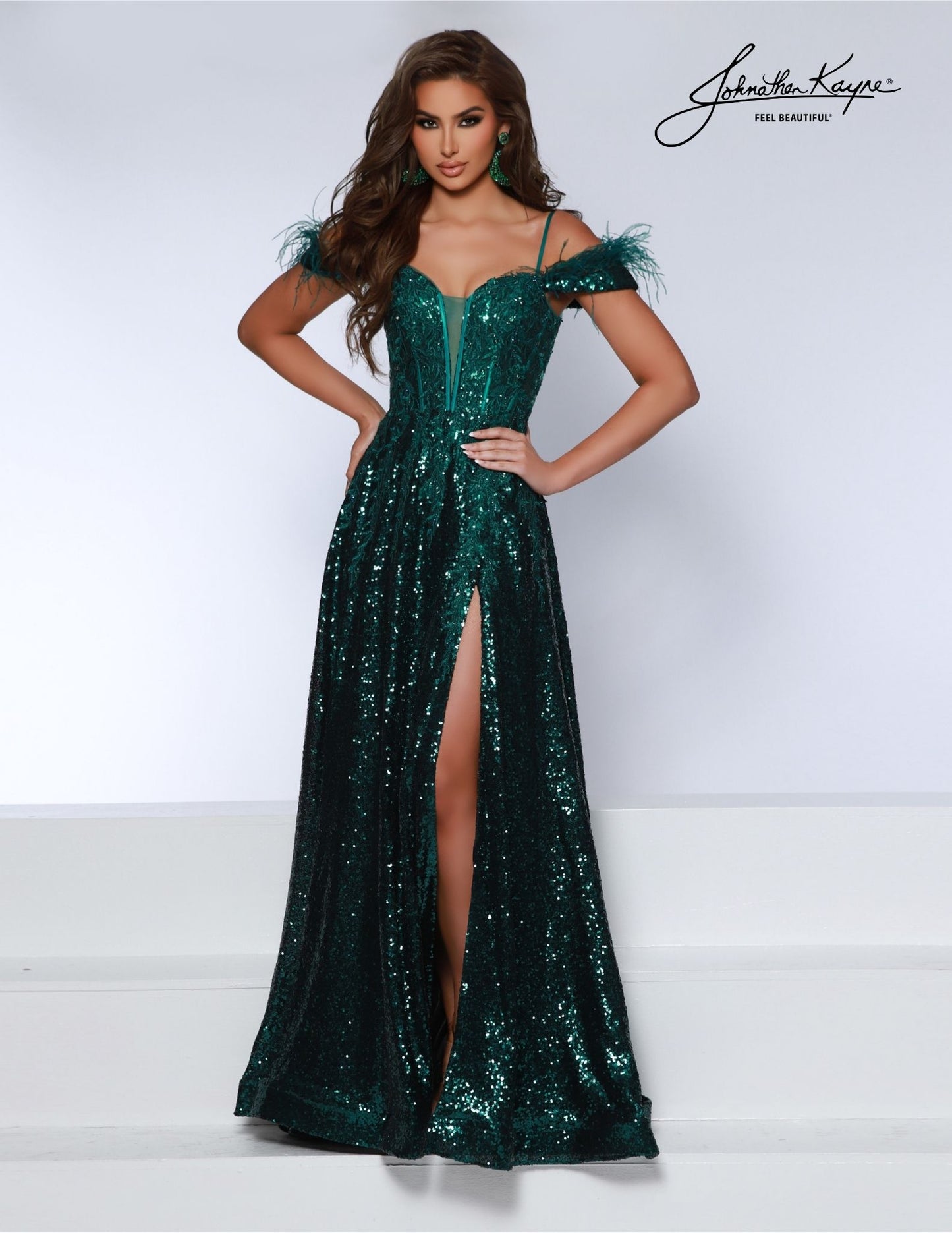 This Johnathan Kayne 2887 gown features a stunning feather and sequin design, with a maxi slit and corset lace detailing for a dramatic and elegant look. Perfect for a prom or formal occasion, this dress is sure to make a statement and turn heads. Ensure you are the talk of the town in this sequin mesh A-line gown featuring a thigh high slit and pockets.