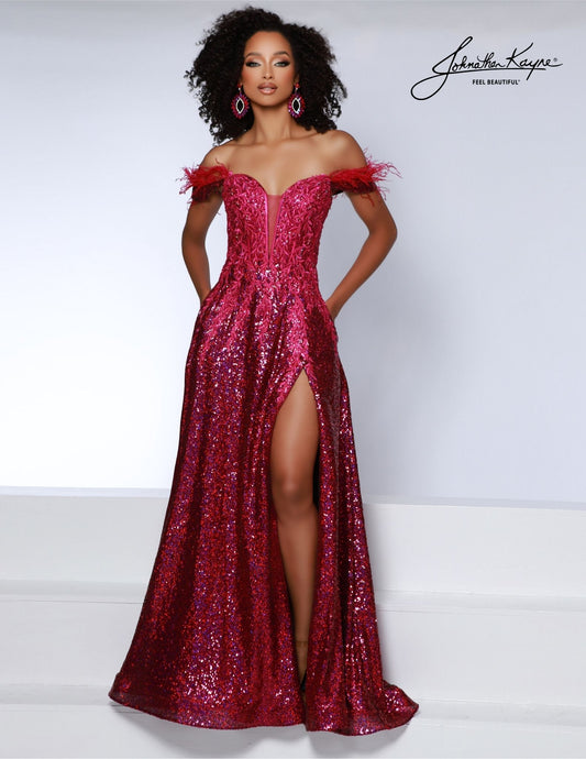 This Johnathan Kayne 2887 gown features a stunning feather and sequin design, with a maxi slit and corset lace detailing for a dramatic and elegant look. Perfect for a prom or formal occasion, this dress is sure to make a statement and turn heads. Ensure you are the talk of the town in this sequin mesh A-line gown featuring a thigh high slit and pockets.