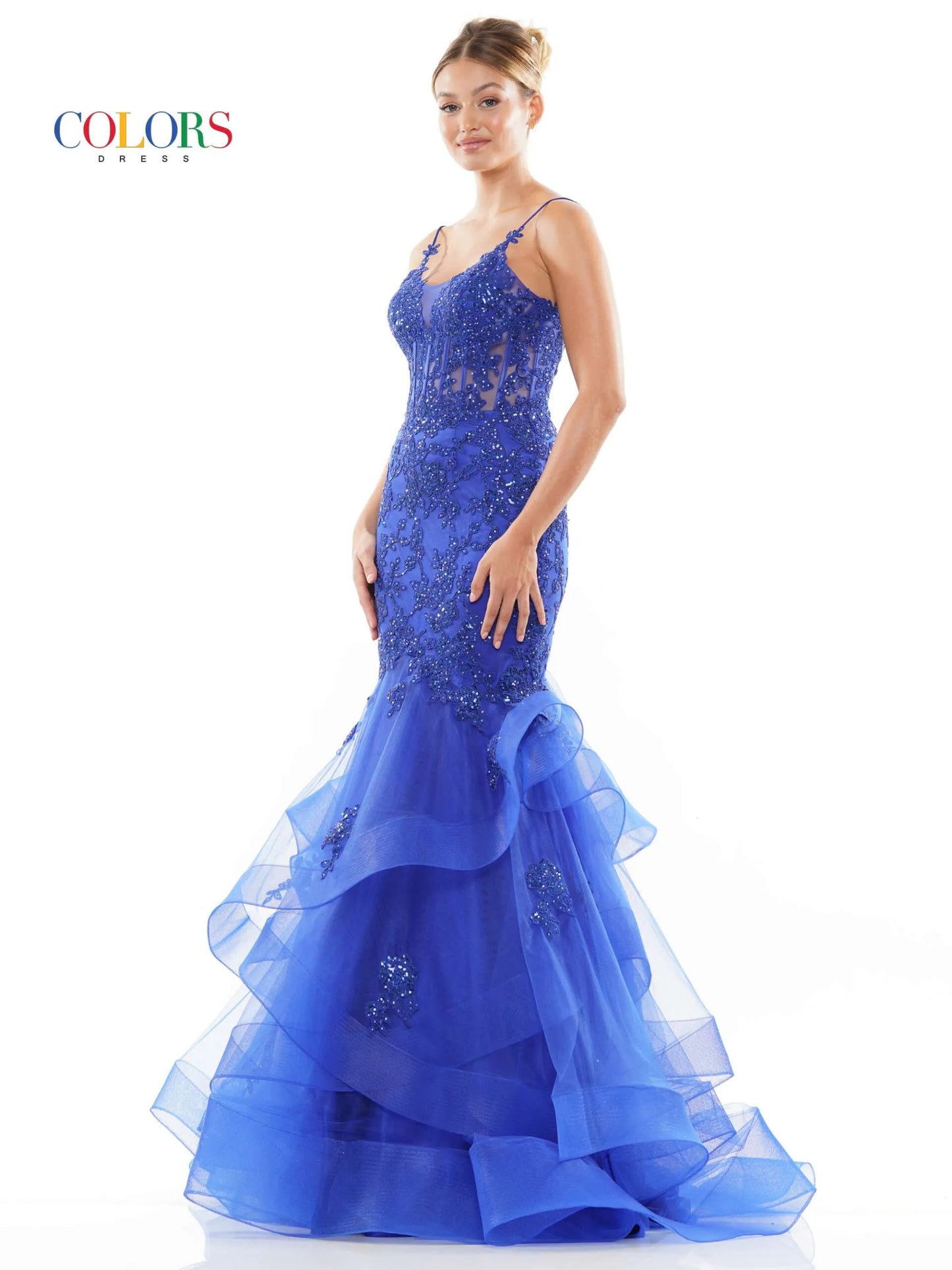 This Colors Dress 2899 Long Prom Dress is designed to flatter your figure with its fitted corset and lace applique details. The layered tulle adds a touch of elegance, perfect for formal events or pageants. Feel confident and beautiful in this stunning gown.
