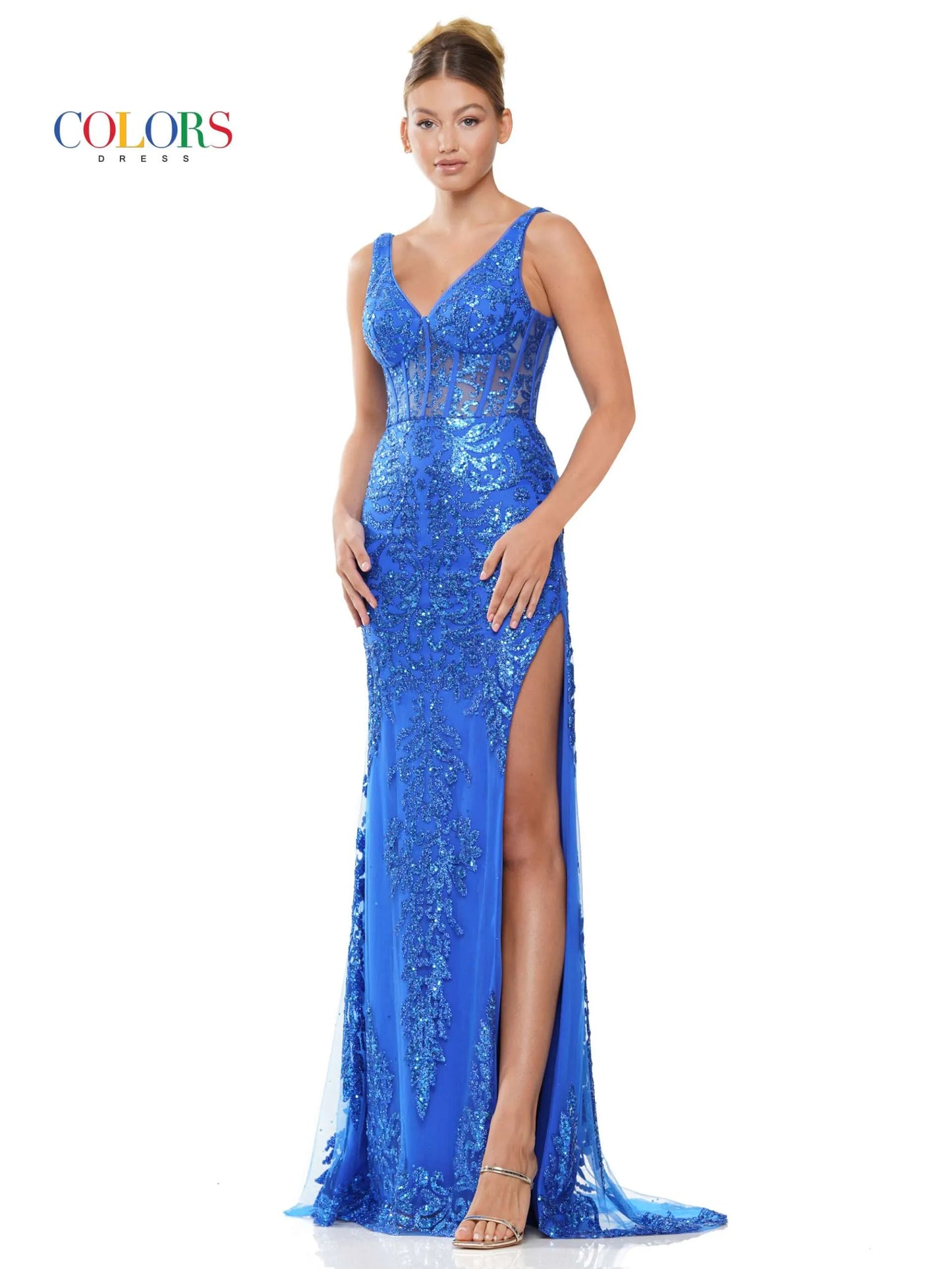 Elevate your formal look in the Colors Dress 2990. The corset top and V-neckline enhance your figure, while the high slit adds a touch of elegance. Crafted with glittered sequin mesh, this gown will make you shine at any pageant or prom, ensuring you stand out from the crowd.