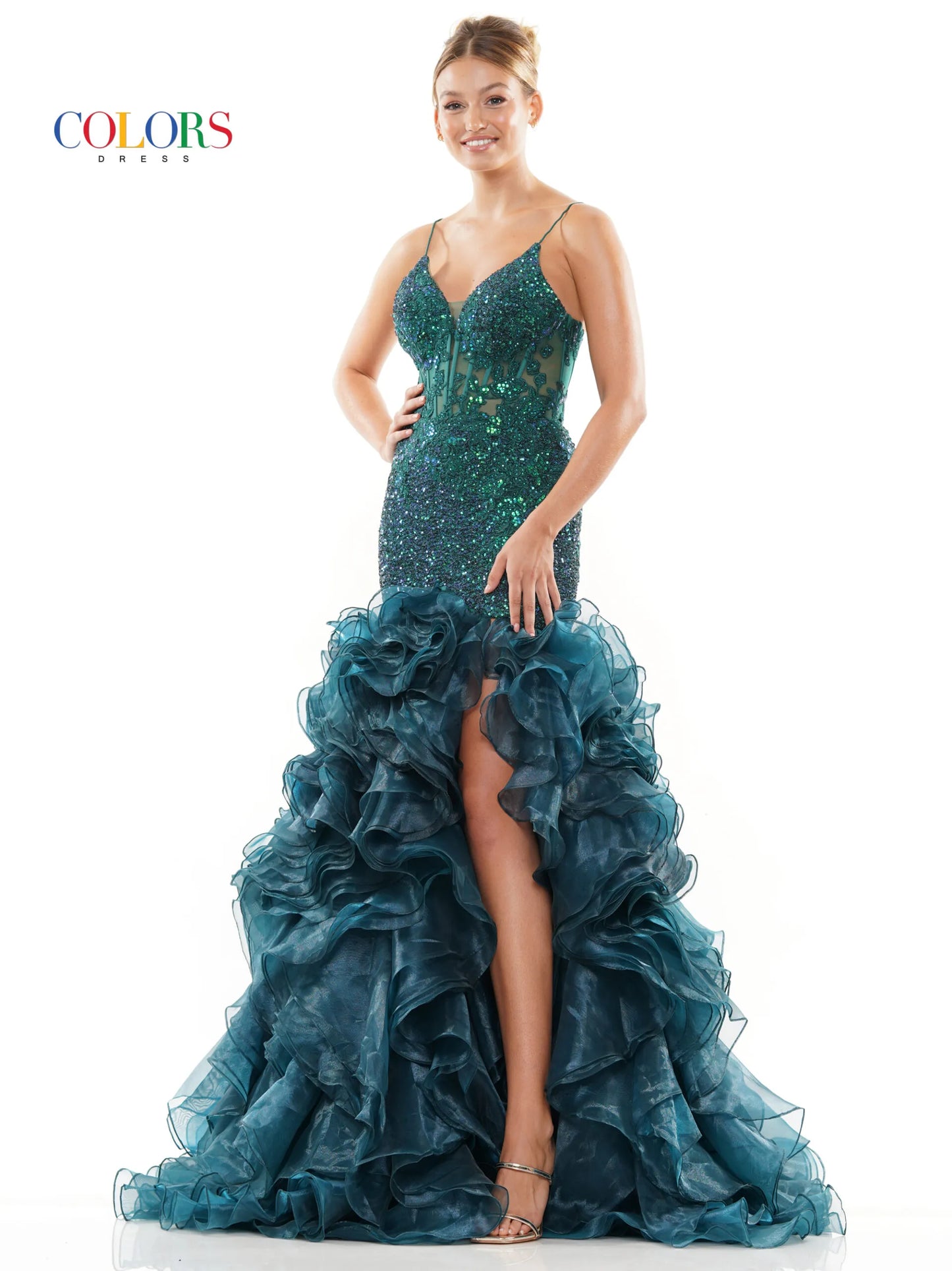 Expertly designed with a lace and sequin embellished sheer corset, this Colors Dress 3214 Layer Ruffle Mermaid Prom Dress features an elegant high slit and sweeping train. Its intricate details and form-flattering silhouette make it the perfect choice for a glamorous and sophisticated evening look. lace up corset back.  Sizes: 0-22  Colors: Black, Red, Blue, Deep Green