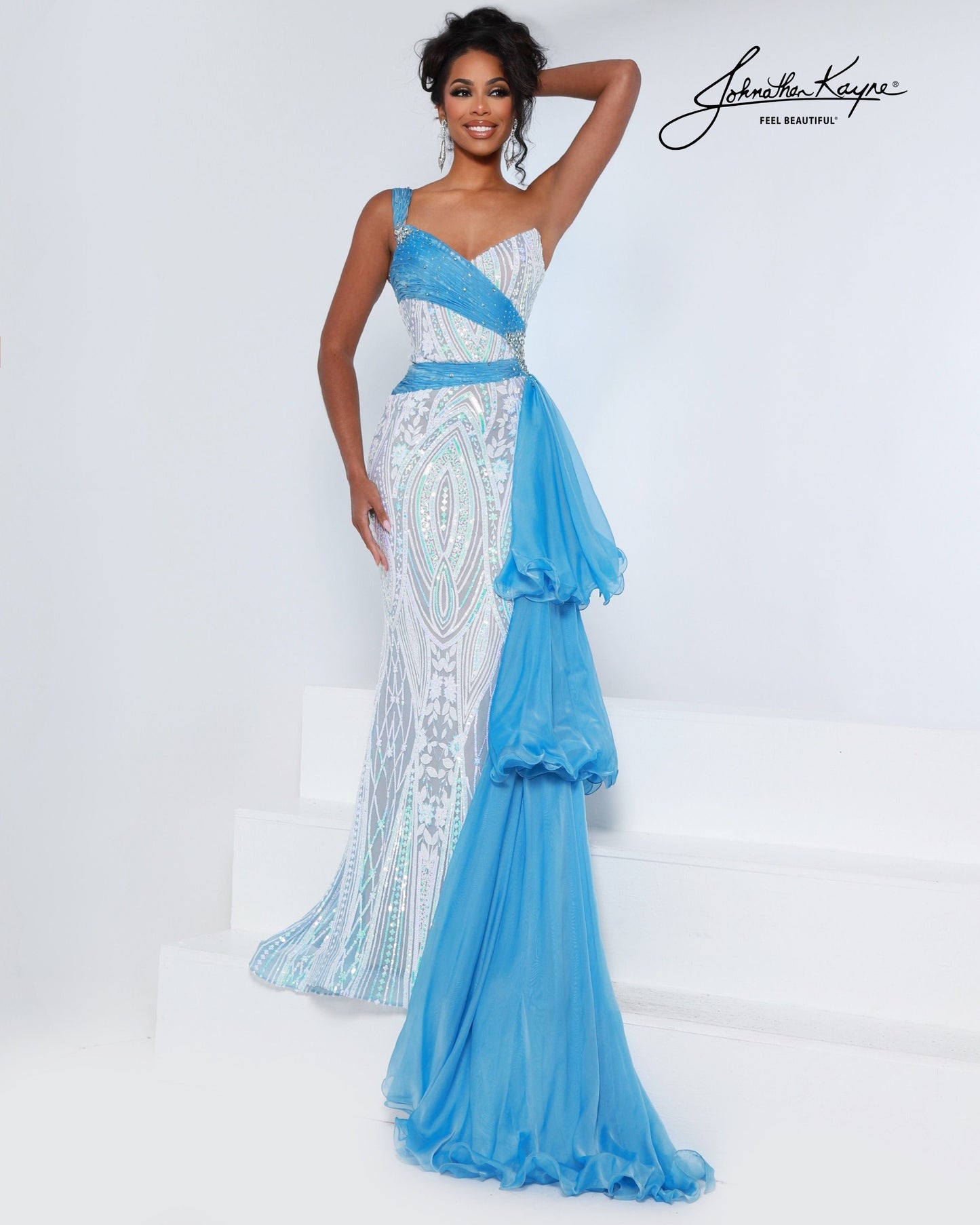 Designer: Johnathan Kayne — Style 3219
Style 3219 is a flowy Johnathan Kayne long prom dress crafted from lightweight special occasion fabrics for beautiful movement. The skirt glides effortlessly with every step, creating an elegant pageant dress silhouette that photographs beautifully and stands out on stage or on the dance floor.

Sizes: 000, 00, 0, 2, 4, 6, 8, 10, 12, 14, 16
Colors: Sky Blue, Lilac