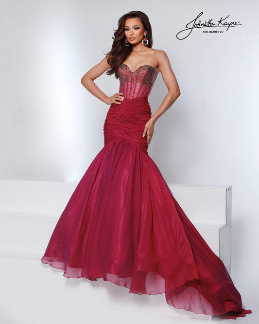 Designer: Johnathan Kayne — Style 3226
Style 3226 is a flowy Johnathan Kayne long prom dress crafted from lightweight special occasion fabrics for beautiful movement. The skirt glides effortlessly with every step, creating an elegant pageant dress silhouette that photographs beautifully and stands out on stage or on the dance floor.

Sizes: 000, 00, 0, 2, 4, 6, 8, 10, 12, 14, 16
Colors: Midnight, Raspberry