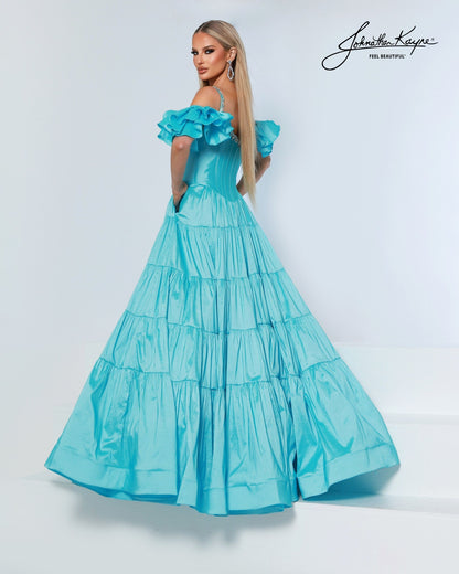 Designer: Johnathan Kayne — Style 3230
Johnathan Kayne style 3230 is a sleek long prom dress in a smooth, structured fabric that highlights the natural shape of the body. The clean lines and refined details make this gown a versatile choice for prom, pageant, and evening occasions that call for a polished, modern gown.

Sizes: 000, 00, 0, 2, 4, 6, 8, 10, 12, 14, 16
Colors: Aqua, Black, Petal Pink