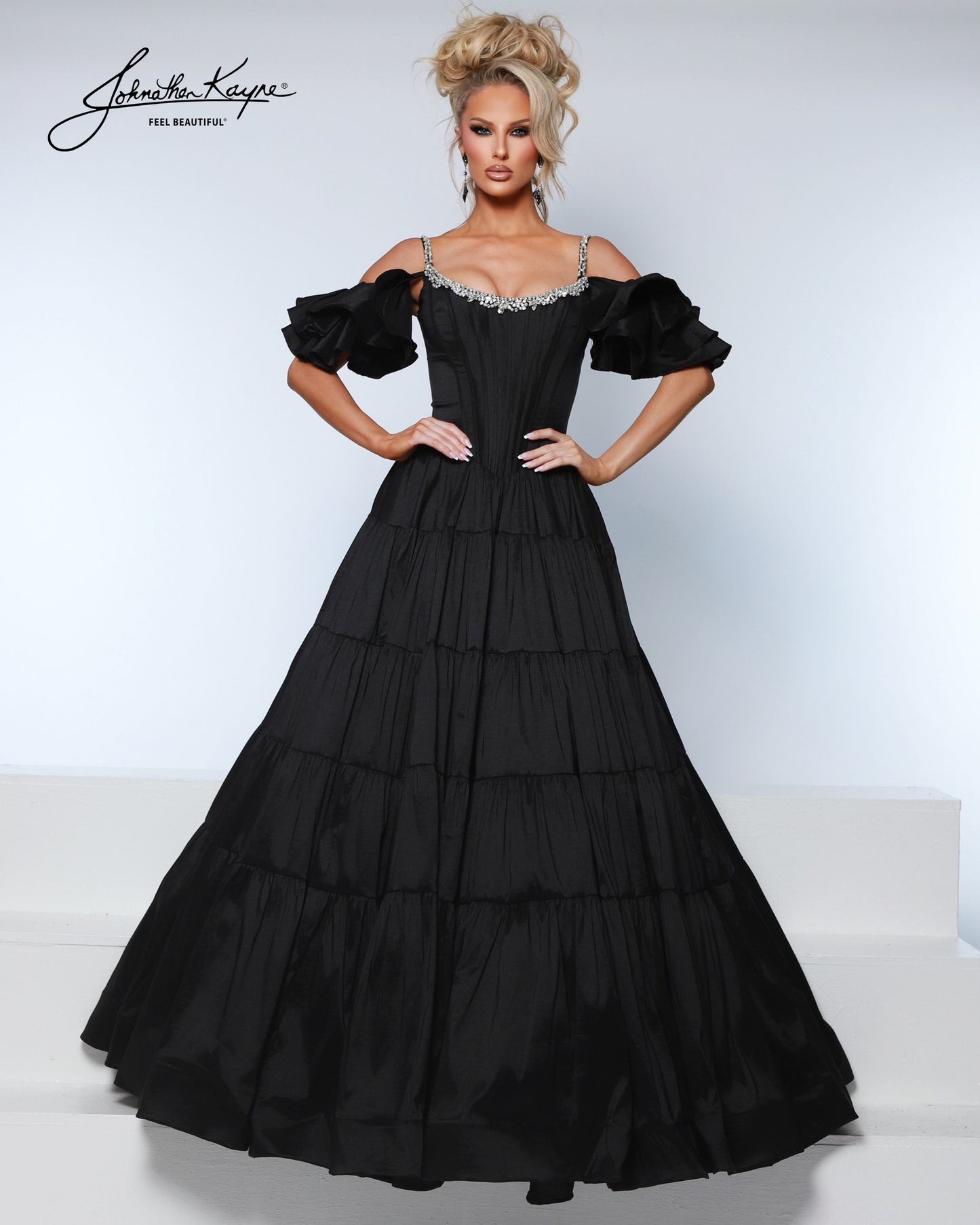 Designer: Johnathan Kayne — Style 3230
Johnathan Kayne style 3230 is a sleek long prom dress in a smooth, structured fabric that highlights the natural shape of the body. The clean lines and refined details make this gown a versatile choice for prom, pageant, and evening occasions that call for a polished, modern gown.

Sizes: 000, 00, 0, 2, 4, 6, 8, 10, 12, 14, 16
Colors: Aqua, Black, Petal Pink