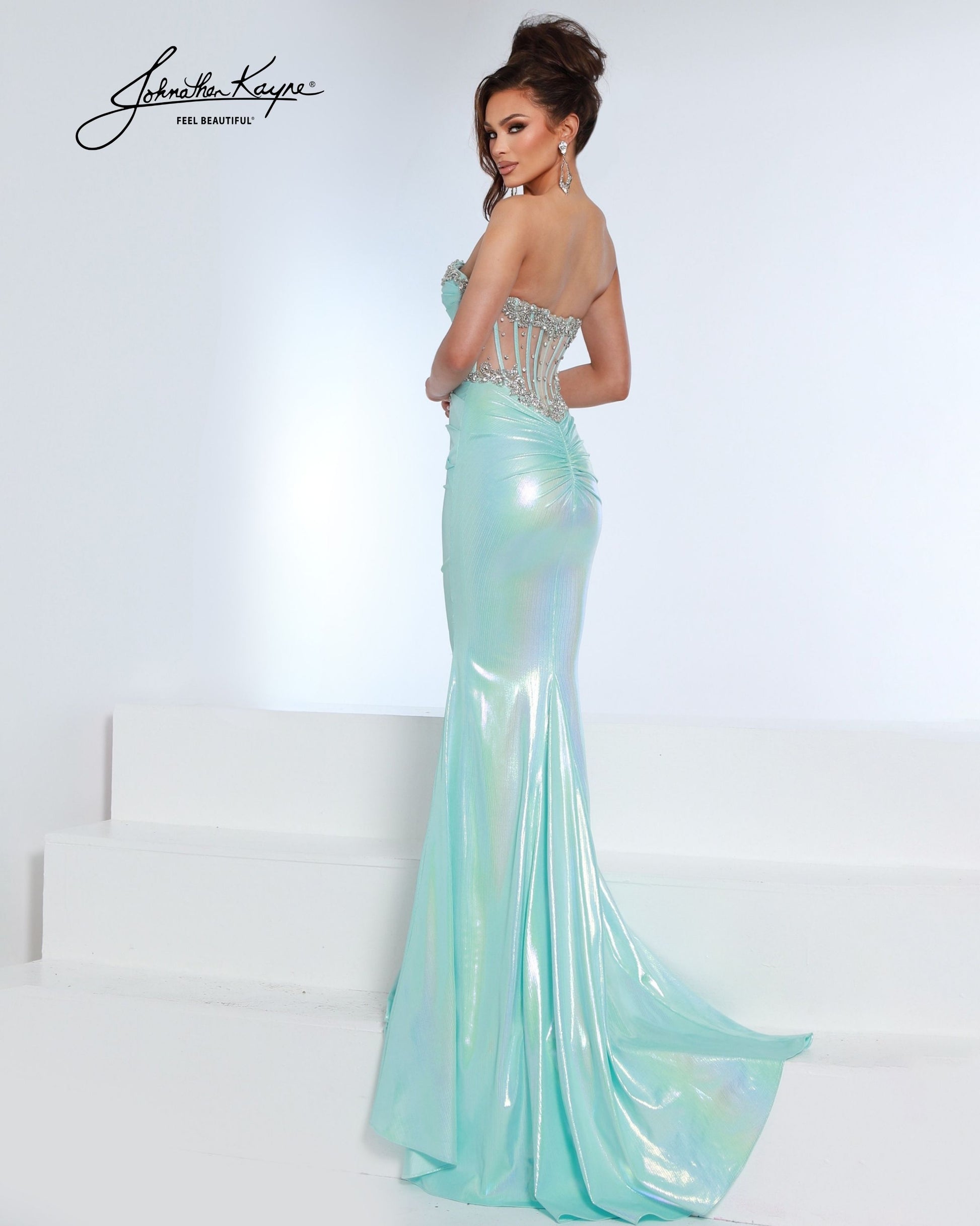 Designer: Johnathan Kayne — Style 3233
Johnathan Kayne style 3233 is a sleek long prom dress in a smooth, structured fabric that highlights the natural shape of the body. The clean lines and refined details make this gown a versatile choice for prom, pageant, and evening occasions that call for a polished, modern gown.

Sizes: 000, 00, 0, 2, 4, 6, 8, 10, 12, 14, 16
Colors: Aqua, Bubblegum
