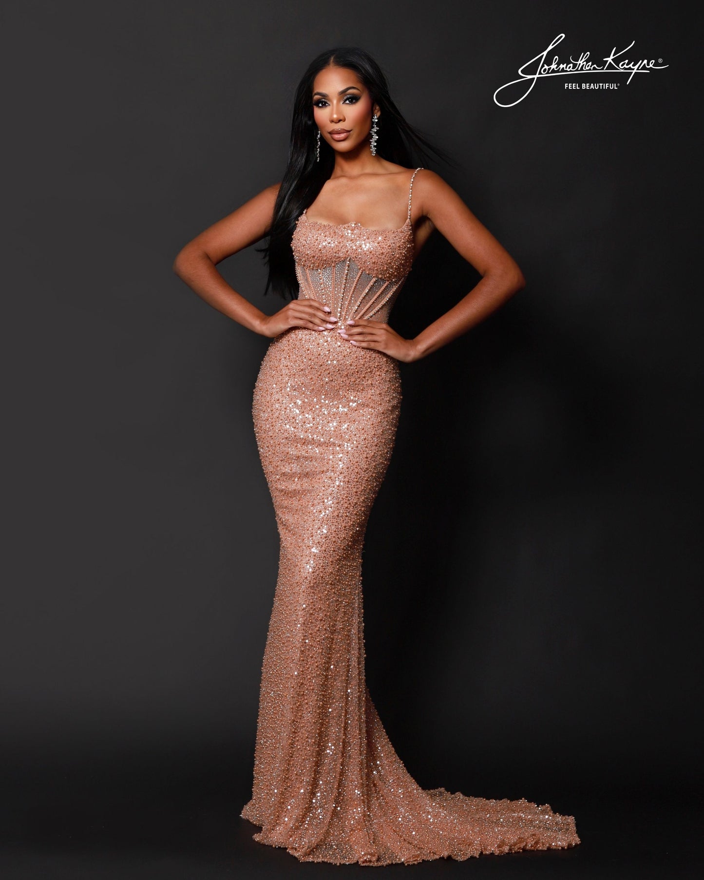 Designer: Johnathan Kayne — Style 3235
Sparkling and eye-catching, Johnathan Kayne style 3235 is a beaded and sequin long prom dress made to catch every light in the room. This fitted pageant dress offers a glamorous, red-carpet feel that is perfect for prom, pageant, and formal events where she wants a show-stopping gown.

Sizes: 000, 00, 0, 2, 4, 6, 8, 10, 12, 14, 16
Colors: Barbie Pink, Dark Nude, Ice Blue
