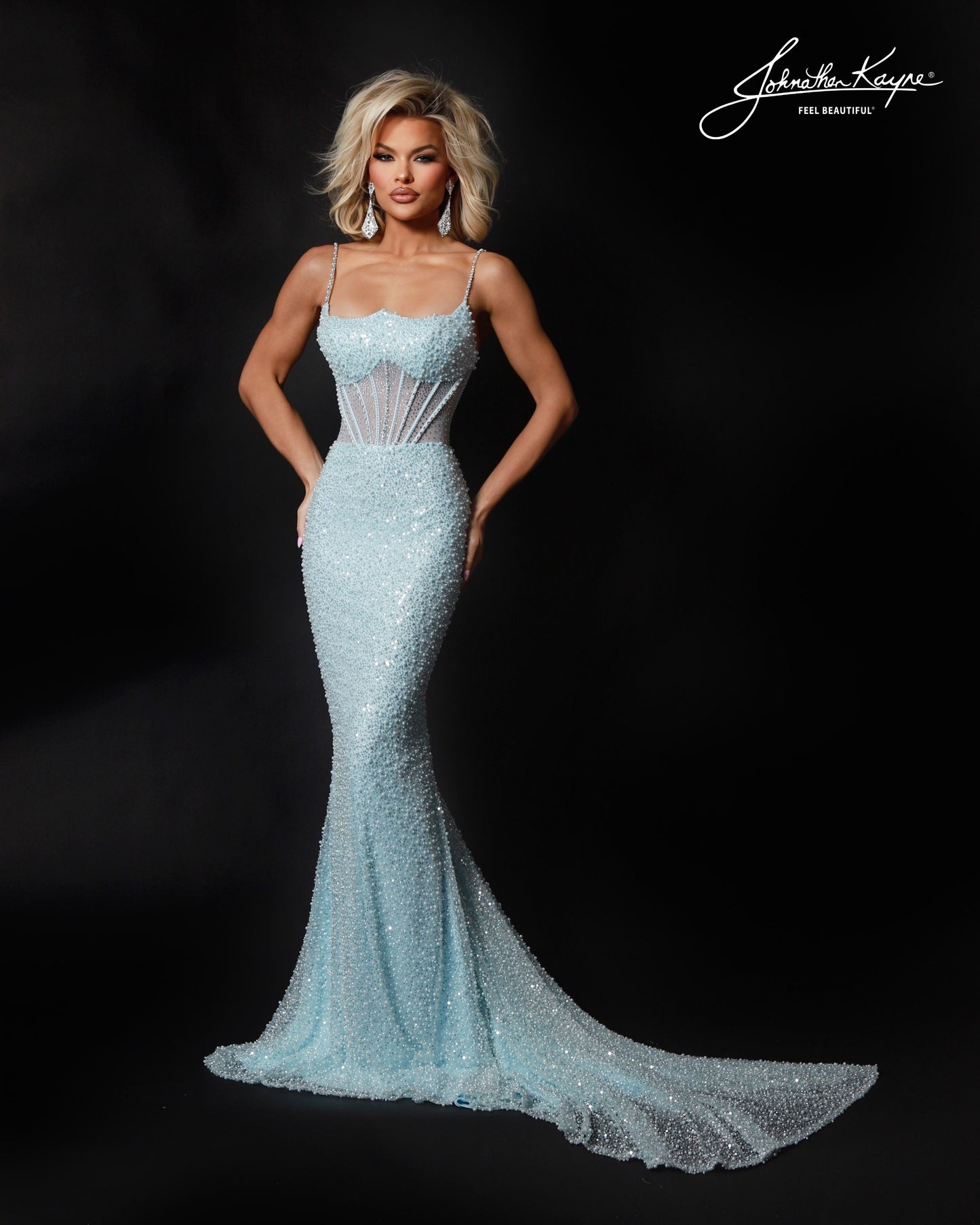 Designer: Johnathan Kayne — Style 3235
Sparkling and eye-catching, Johnathan Kayne style 3235 is a beaded and sequin long prom dress made to catch every light in the room. This fitted pageant dress offers a glamorous, red-carpet feel that is perfect for prom, pageant, and formal events where she wants a show-stopping gown.

Sizes: 000, 00, 0, 2, 4, 6, 8, 10, 12, 14, 16
Colors: Barbie Pink, Dark Nude, Ice Blue