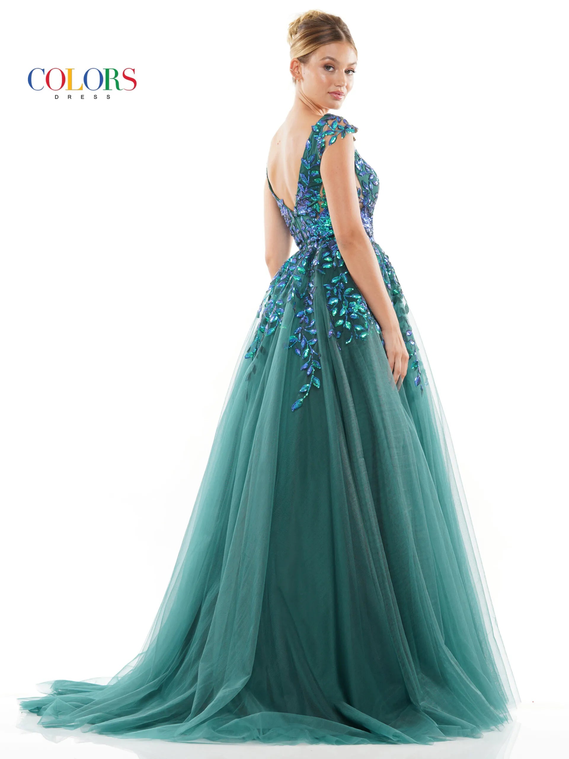With sheer side panels, the Colors Dress 3239 ballgown offers a touch of elegance to your prom or pageant look. The sheer sequin lace adds a subtle shimmer, making you stand out in the crowd. Available in plus sizes, this formal gown is perfect for any special occasion.  Sizes: 0-22  Colors: Light Blue, Off White, Deep Green, Hot Pink