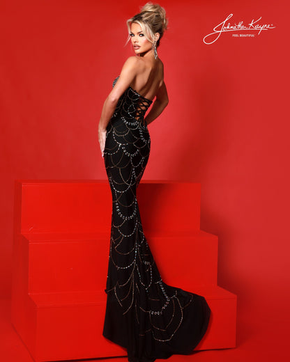 Designer: Johnathan Kayne — Style 3245
Designed in stretch knit fabrics, Johnathan Kayne style 3245 is a body-conscious long prom dress that offers both comfort and style. The stretchy construction allows the dress to move with you, making it a great option for pageant, prom, or any event where a fitted gown with flexibility is desired.

Sizes: 000, 00, 0, 2, 4, 6, 8, 10, 12, 14, 16
Colors: Black, Light Nude, Red