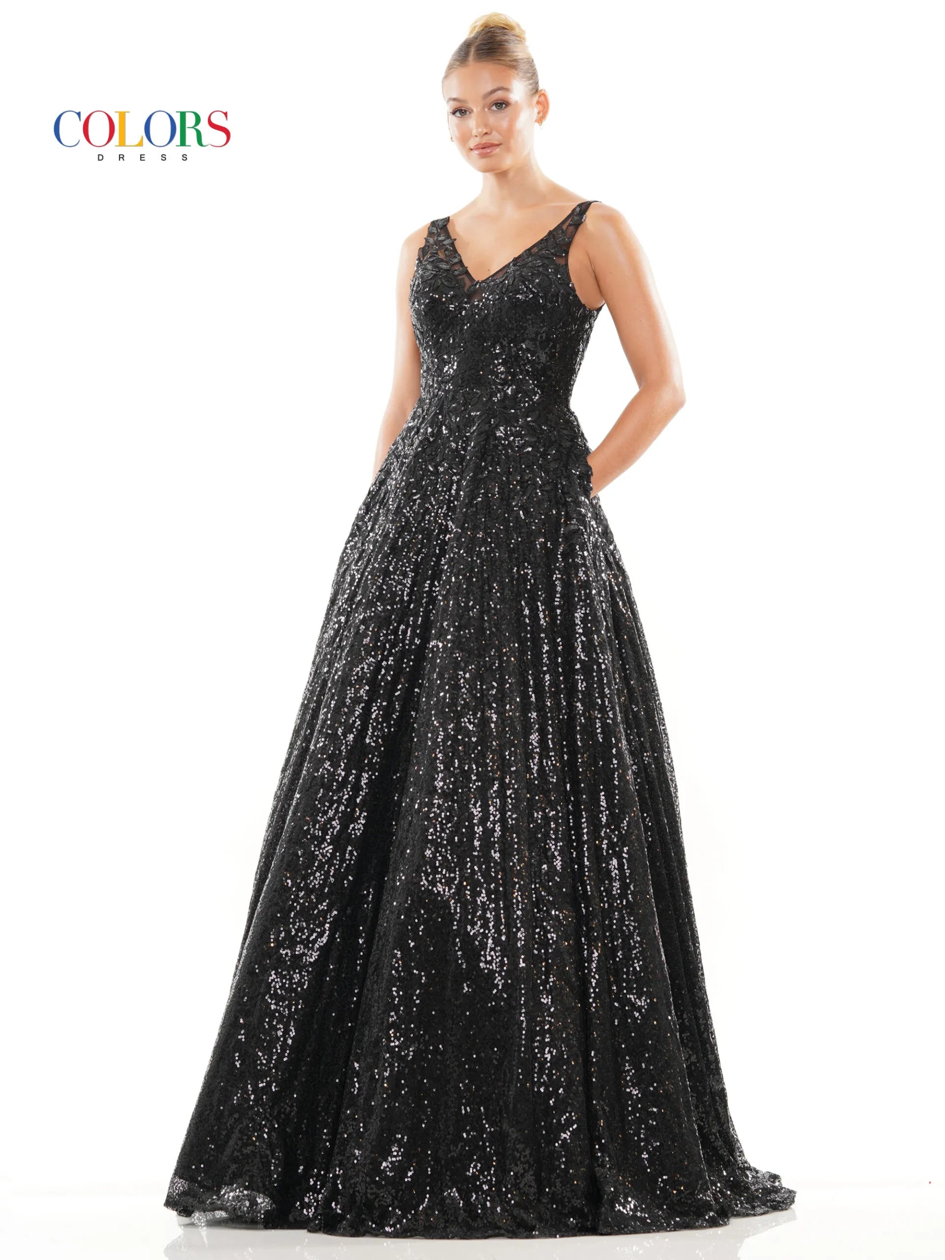 Discover elegance and sophistication with the Colors Dress 3246. This stunning A-Line Prom Dress features striking sequin lace and a flattering V-neckline. The added benefit of pockets makes it perfect for any formal occasion. Complete with a sheer back for a touch of allure.  Sizes: 0-22  Colors: Black, Light Blue, Lavender, Pink