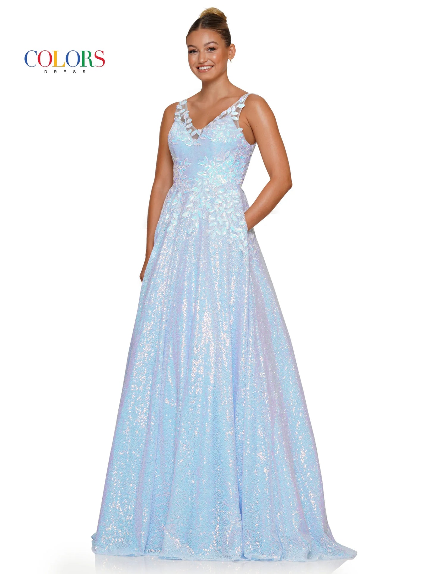 Discover elegance and sophistication with the Colors Dress 3246. This stunning A-Line Prom Dress features striking sequin lace and a flattering V-neckline. The added benefit of pockets makes it perfect for any formal occasion. Complete with a sheer back for a touch of allure.  Sizes: 0-22  Colors: Black, Light Blue, Lavender, Pink
