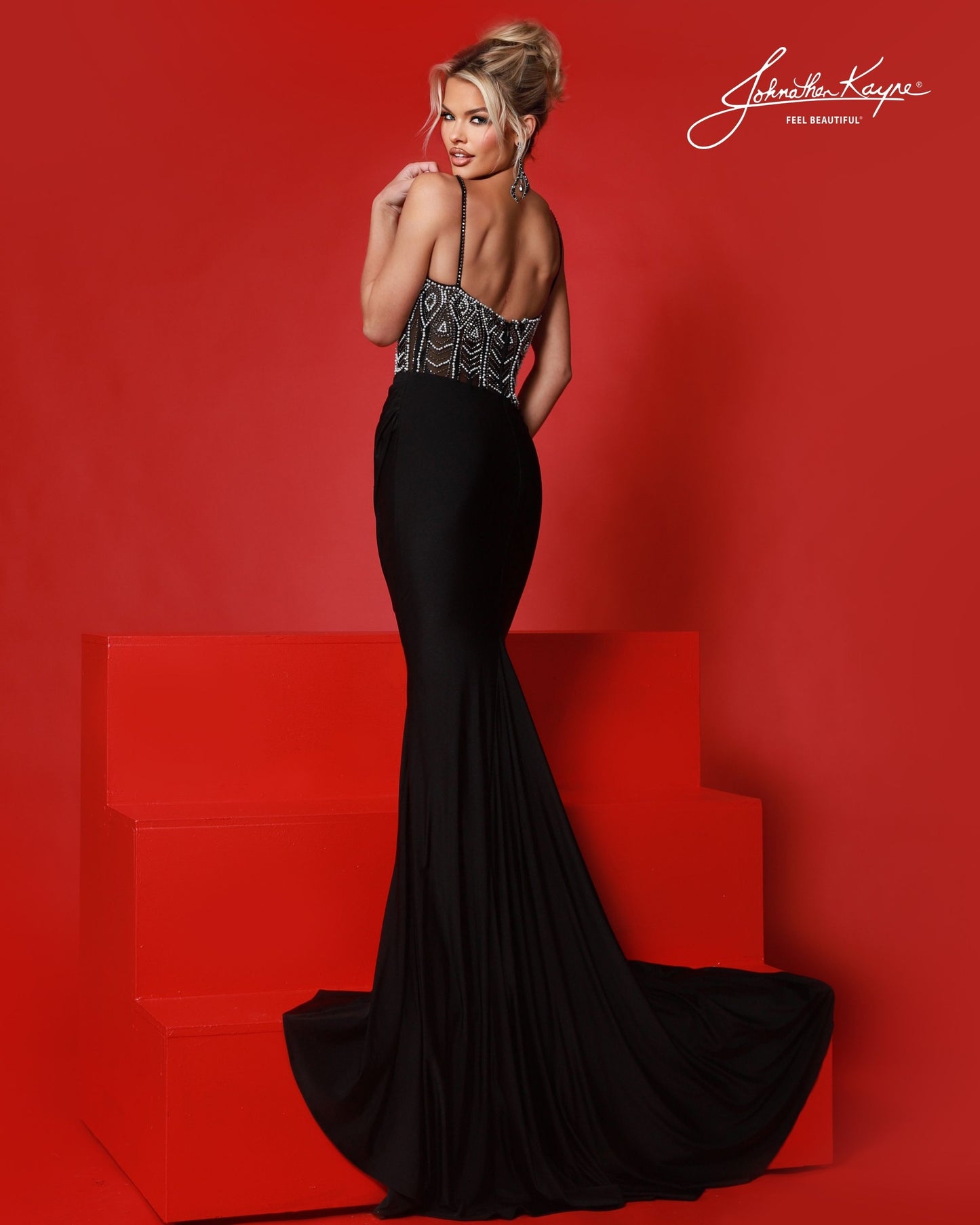 Designer: Johnathan Kayne — Style 3247
Designed in stretch knit fabrics, Johnathan Kayne style 3247 is a body-conscious long prom dress that offers both comfort and style. The stretchy construction allows the dress to move with you, making it a great option for pageant, prom, or any event where a fitted gown with flexibility is desired.

Sizes: 000, 00, 0, 2, 4, 6, 8, 10, 12, 14, 16
Colors: Black/White, Red