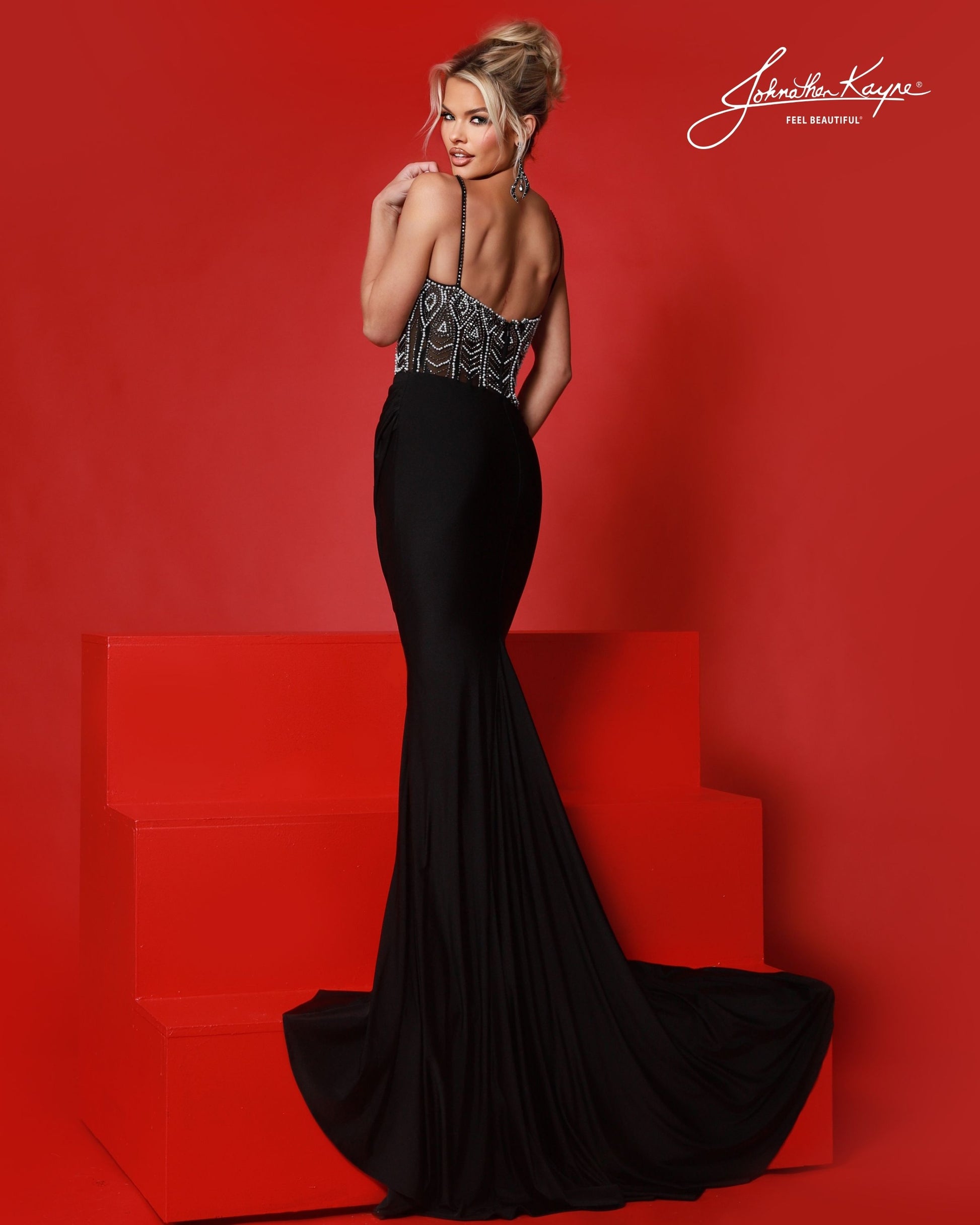 Designer: Johnathan Kayne — Style 3247
Designed in stretch knit fabrics, Johnathan Kayne style 3247 is a body-conscious long prom dress that offers both comfort and style. The stretchy construction allows the dress to move with you, making it a great option for pageant, prom, or any event where a fitted gown with flexibility is desired.

Sizes: 000, 00, 0, 2, 4, 6, 8, 10, 12, 14, 16
Colors: Black/White, Red